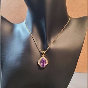 Amethyst and cubic zirconia set in gold plate